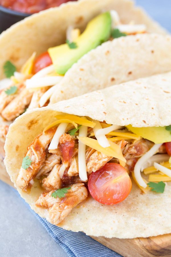 An easy recipe for 3-Ingredient Slow Cooker Taco Chicken. My family has made this so many times we've lost count! It's a healthy weeknight dinner made simple with the help of your crock pot!