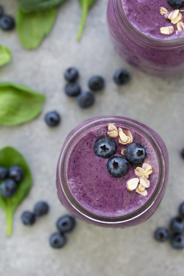 Start your day with this healthy smoothie and get in some greens, fruit, oats, and high protein yogurt! This Blueberry Spinach Breakfast Smoothie is packed with superfoods and perfect for busy mornings! It makes a healthy breakfast for kids or a nutritious snack. There is no banana in this blueberry smoothie.