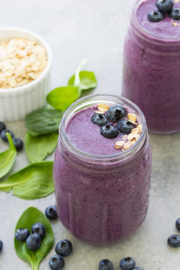 Start your day with this healthy smoothie and get in some greens, fruit, oats, and high protein yogurt! This Blueberry Spinach Breakfast Smoothie is packed with superfoods and perfect for busy mornings! It makes a healthy breakfast for kids or a nutritious snack. There is no banana in this blueberry smoothie.
