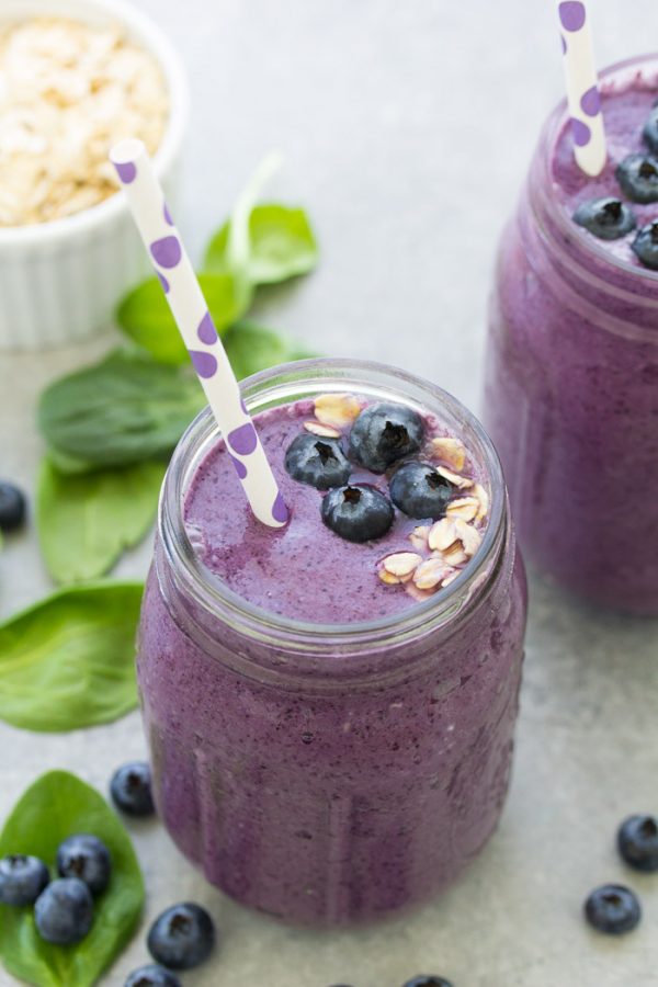 Start your day with this healthy smoothie and get in some greens, fruit, oats, and high protein yogurt! This Blueberry Spinach Breakfast Smoothie is packed with superfoods and perfect for busy mornings! It makes a healthy breakfast for kids or a nutritious snack. There is no banana in this blueberry smoothie.