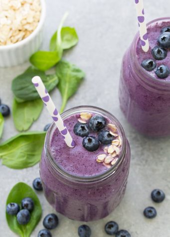 Start your day with this healthy smoothie and get in some greens, fruit, oats, and high protein yogurt! This Blueberry Spinach Breakfast Smoothie is packed with superfoods and perfect for busy mornings! It makes a healthy breakfast for kids or a nutritious snack. There is no banana in this blueberry smoothie.