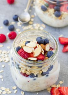 Easy overnight oats recipe made with four ingredients and topped with strawberries, blueberries and almonds.