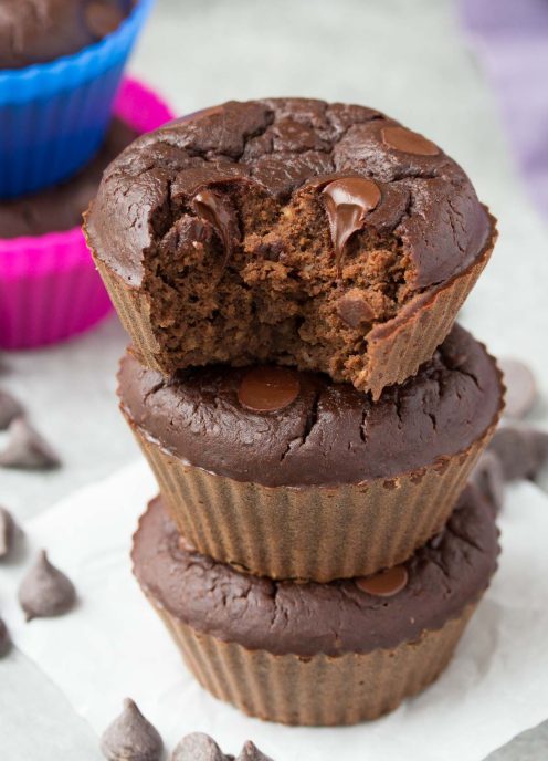 Chocolate Black Bean Blender Muffins, three muffins stacked on top of each other.