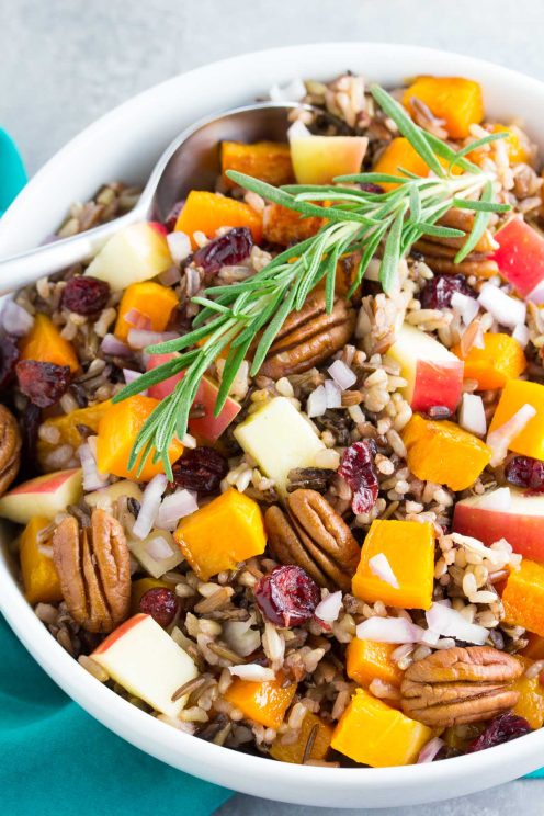 An easy, delicious holiday side dish or make ahead lunch. You will make this Roasted Butternut Squash Wild Rice Salad with Apple, Cranberries and apple cider dressing again and again! | www.kristineskitchenblog.com