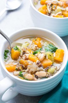 Slow Cooker Wild Rice Vegetable Soup - This healthy crock pot soup is great for meal prep lunches and dinners! With butternut squash and kale. Vegetarian & Vegan | www.kristineskitchenblog.com
