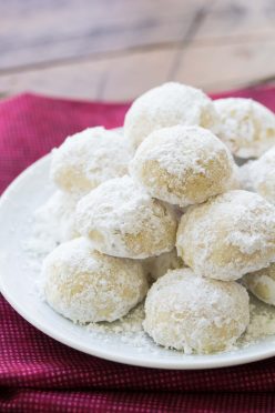 These Butter Snowballs Cookies are soft, buttery, melt in your mouth cookies! They are a favorite holiday cookie made with butter, nuts and powdered sugar.