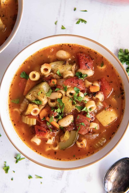 Minestrone soup served in a bowl.