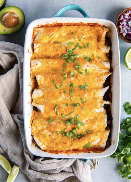 Vegetarian enchiladas in baking dish.